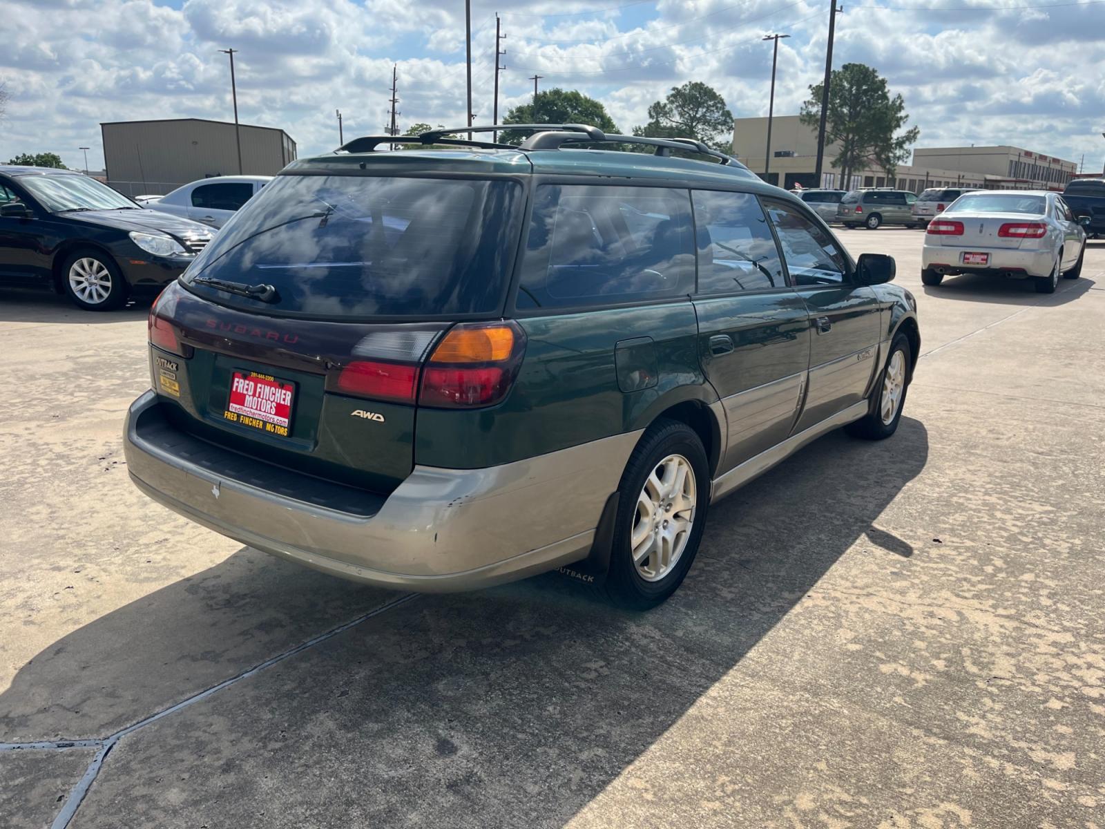 2003 green /TAN Subaru Outback Limited Wagon (4S3BH686737) with an 2.5L H4 SOHC 16V engine, 5-Speed Manual Overdrive transmission, located at 14700 Tomball Parkway 249, Houston, TX, 77086, (281) 444-2200, 29.928619, -95.504074 - Photo #6